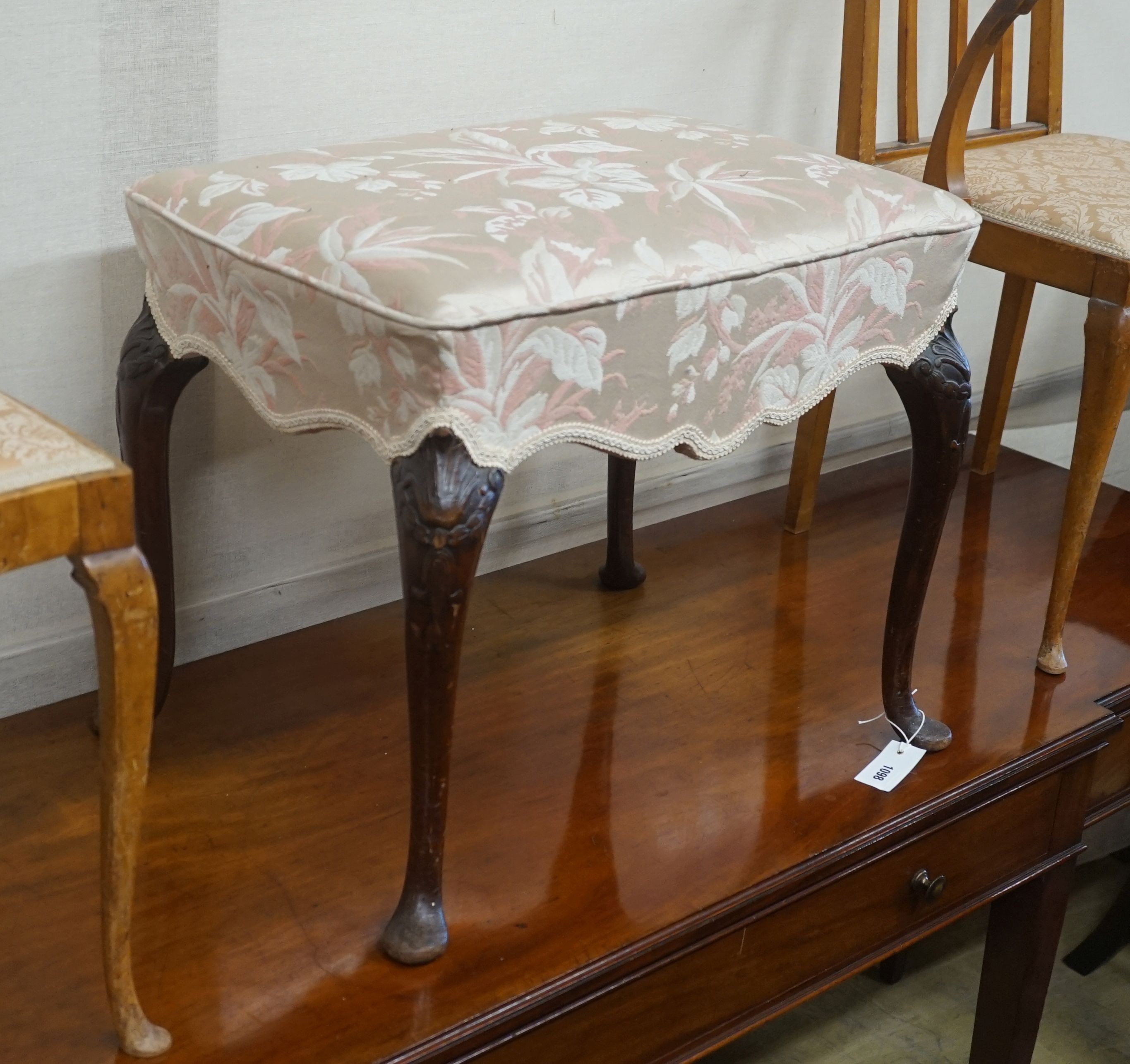 An upholstered footstool, width 60cm, depth 44cm, height 53cm